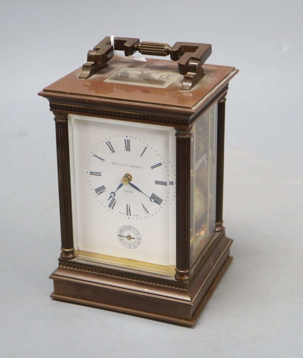 A Matthew Norman brass cased carriage clock, no.1755, overall height 16.5cm (handle down)